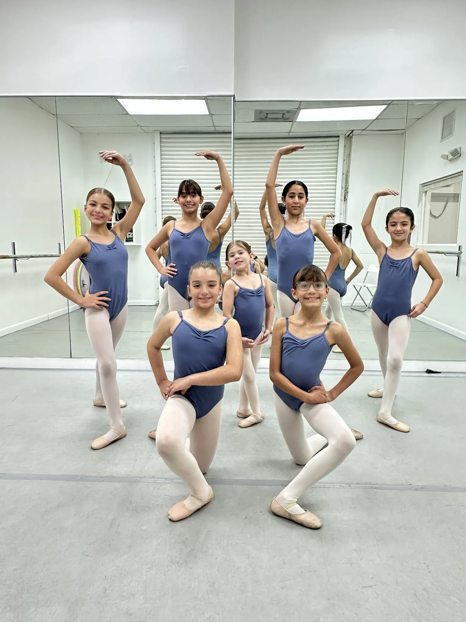 Six Candy Jazz ballet students posing together in the studio