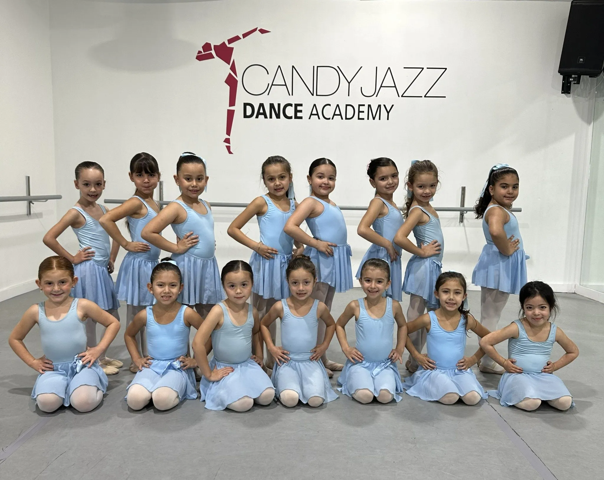 Candy Jazz Creative Dance students posing together in blue dancewear