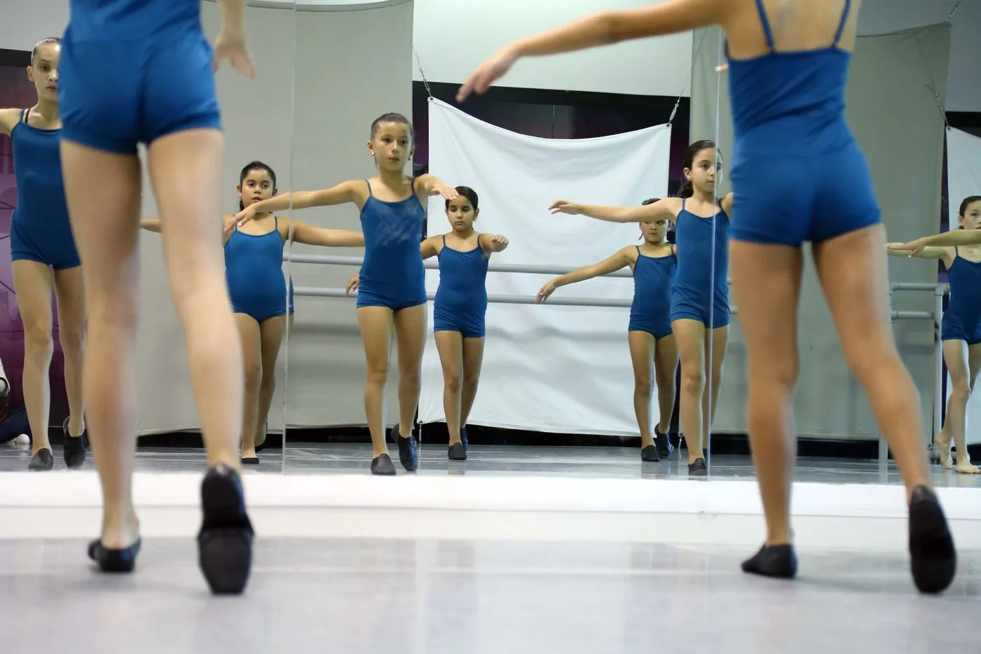 Jazz class in blue leotards