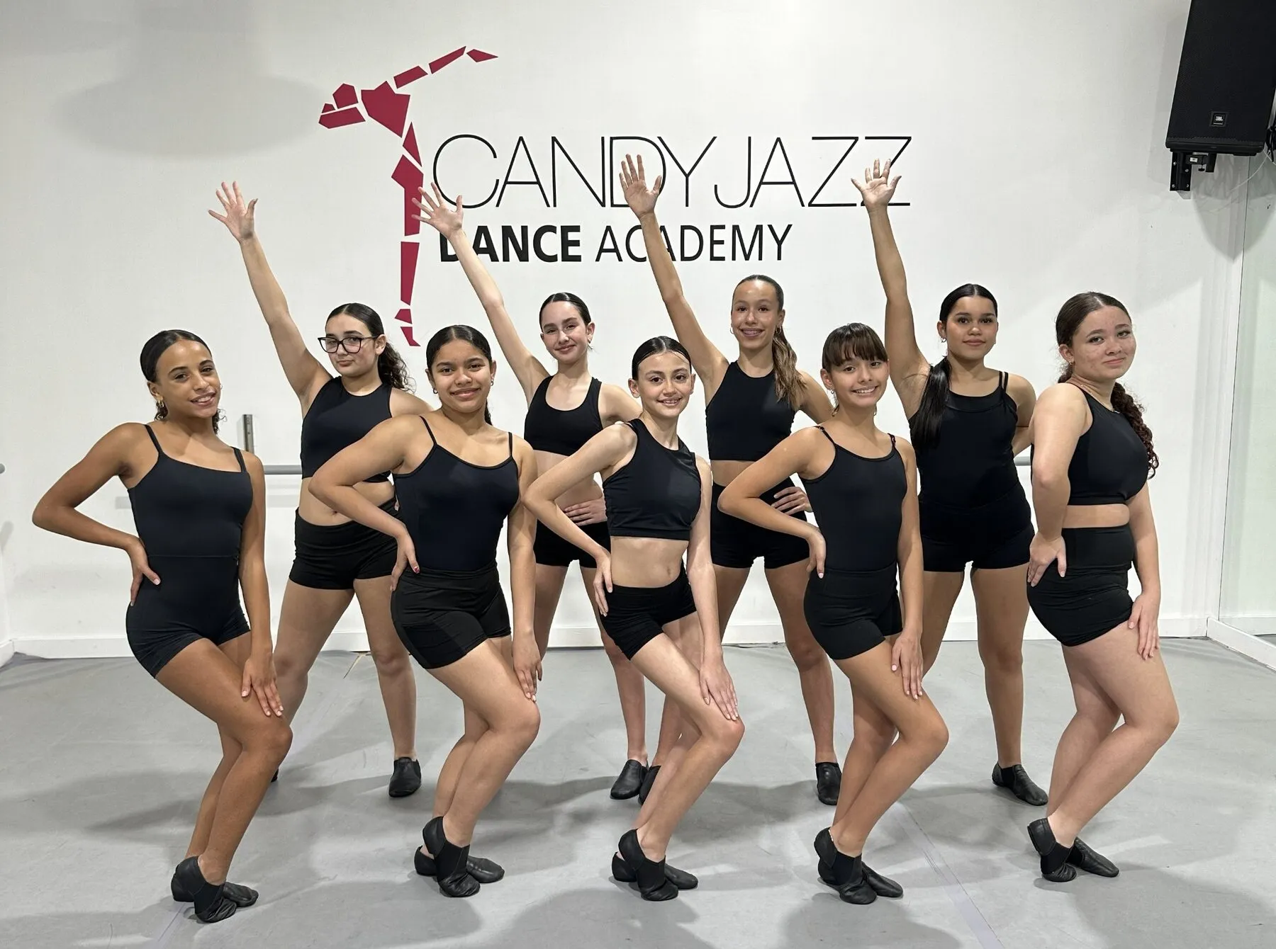 Candy Jazz jazz students posing together in the studio